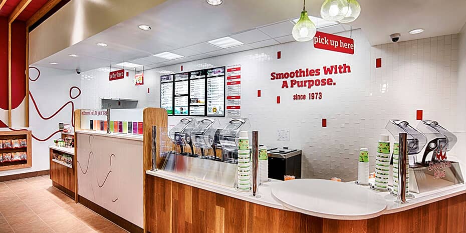 A red and white counter serving ice cream.