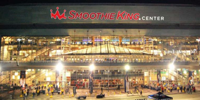 The smoothie king center at night, highlighting the importance of proper training and support in a franchise system.