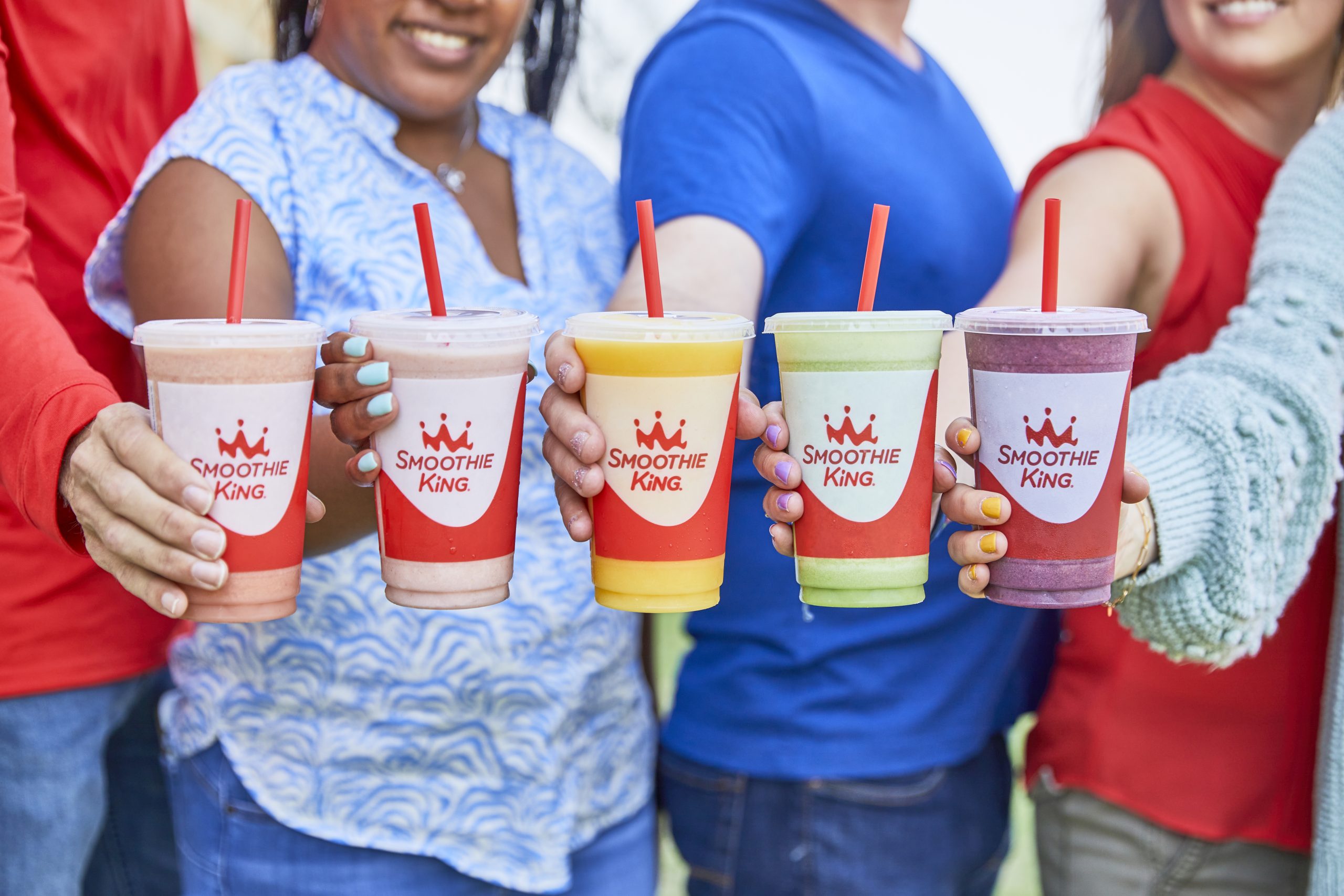 A vibrant assortment of fresh fruits blended into a delicious smoothie at the fruit smoothie franchise.