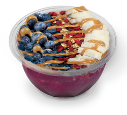 A fruit smoothie franchise serving a bowl filled with blueberries, bananas, and peanut butter.