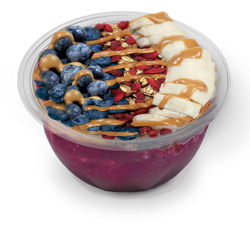 A fruit smoothie franchise serving a bowl filled with blueberries, bananas, and peanut butter.