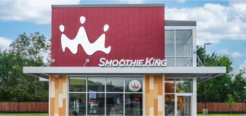 Exterior image of a Smoothie King store during the day